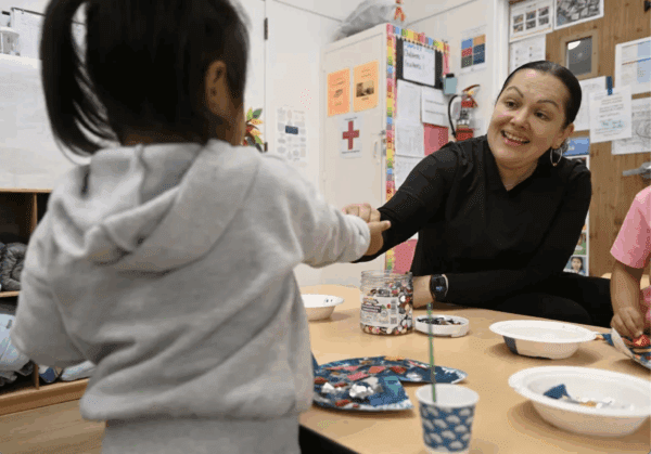 Child and teacher at children's center in San Rafael